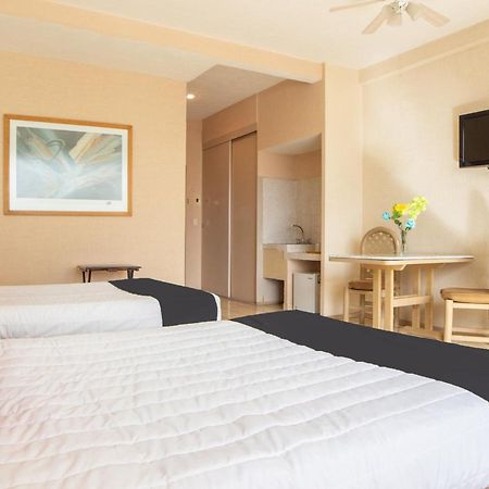 بويبلا Capital O Hotel Villa Monini المظهر الخارجي الصورة