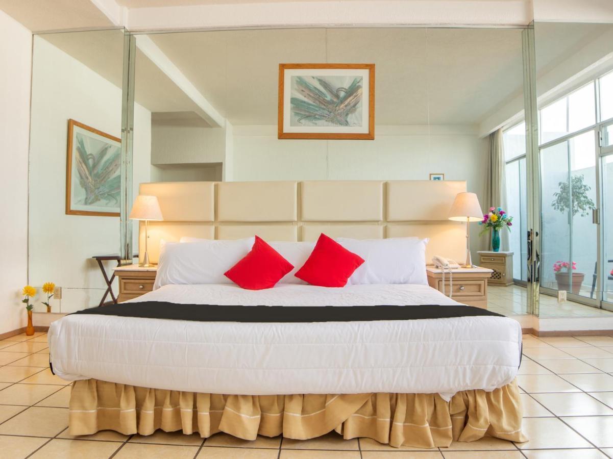 بويبلا Capital O Hotel Villa Monini المظهر الخارجي الصورة