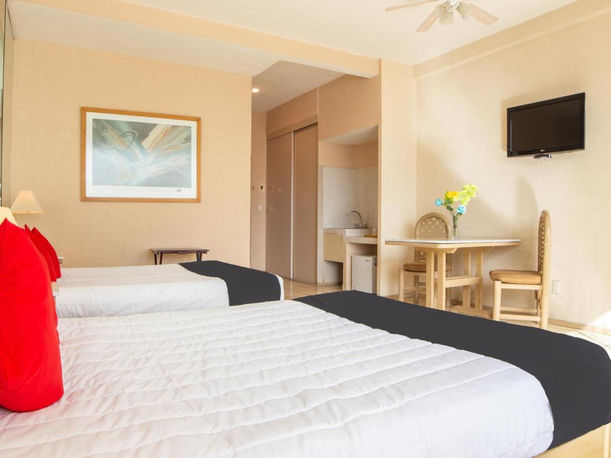 بويبلا Capital O Hotel Villa Monini المظهر الخارجي الصورة