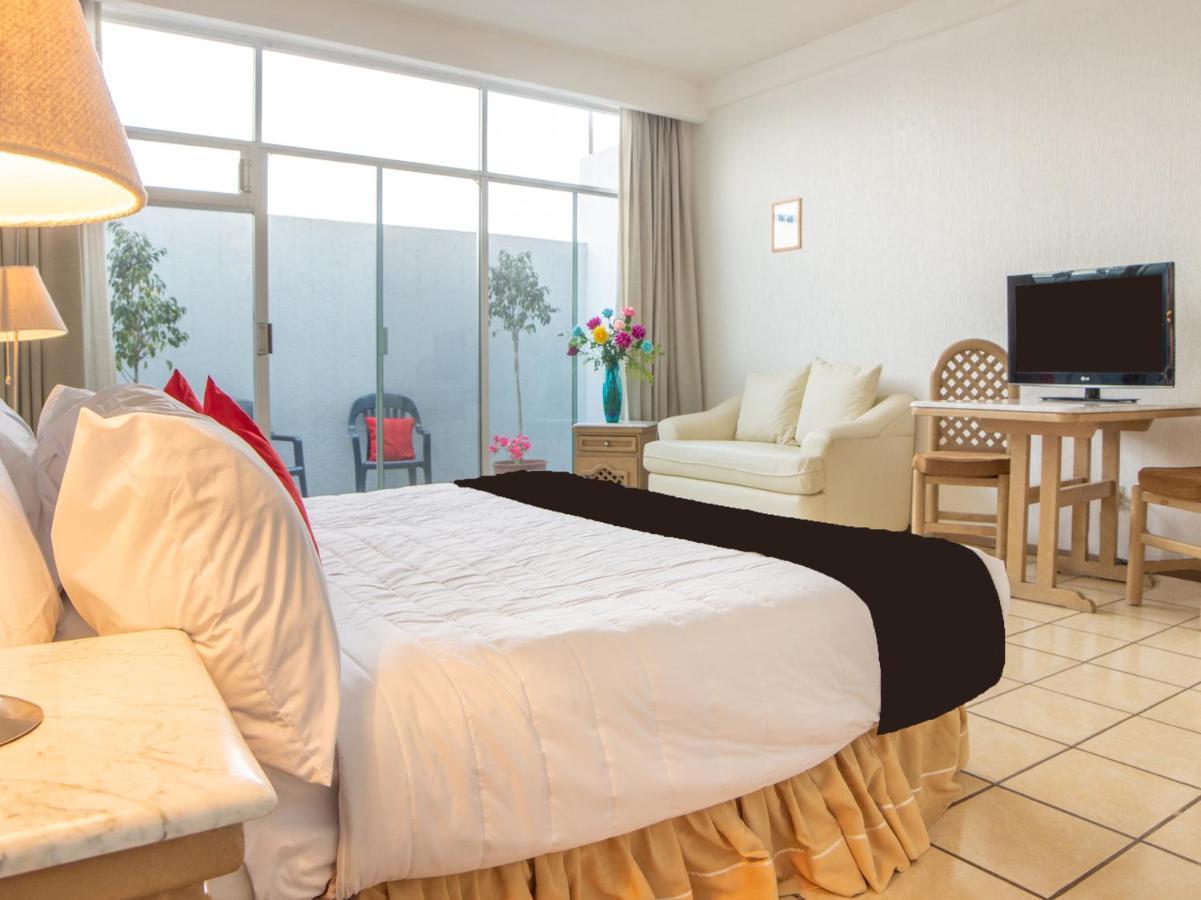 بويبلا Capital O Hotel Villa Monini المظهر الخارجي الصورة