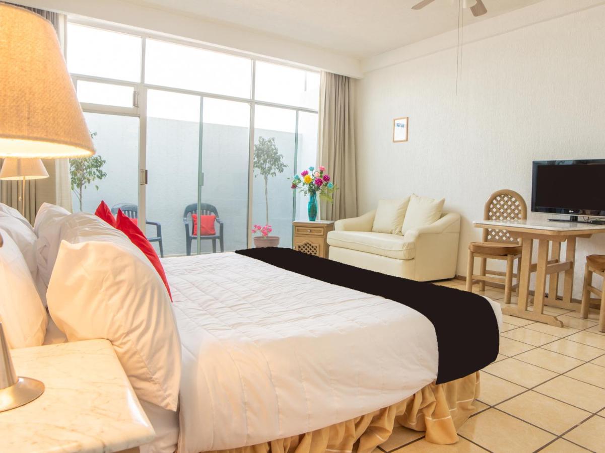 بويبلا Capital O Hotel Villa Monini المظهر الخارجي الصورة