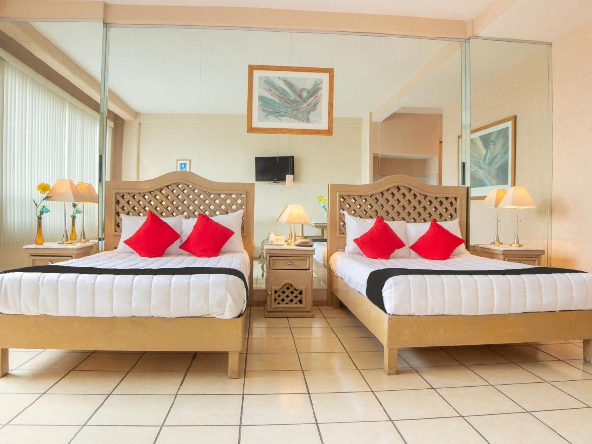 بويبلا Capital O Hotel Villa Monini المظهر الخارجي الصورة