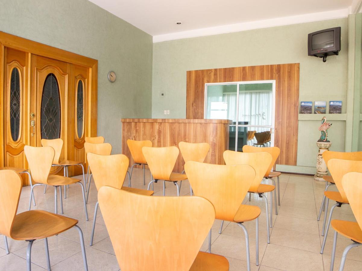 بويبلا Capital O Hotel Villa Monini المظهر الخارجي الصورة