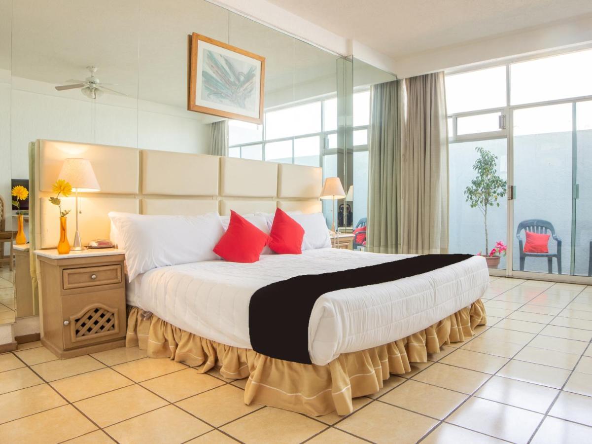 بويبلا Capital O Hotel Villa Monini المظهر الخارجي الصورة