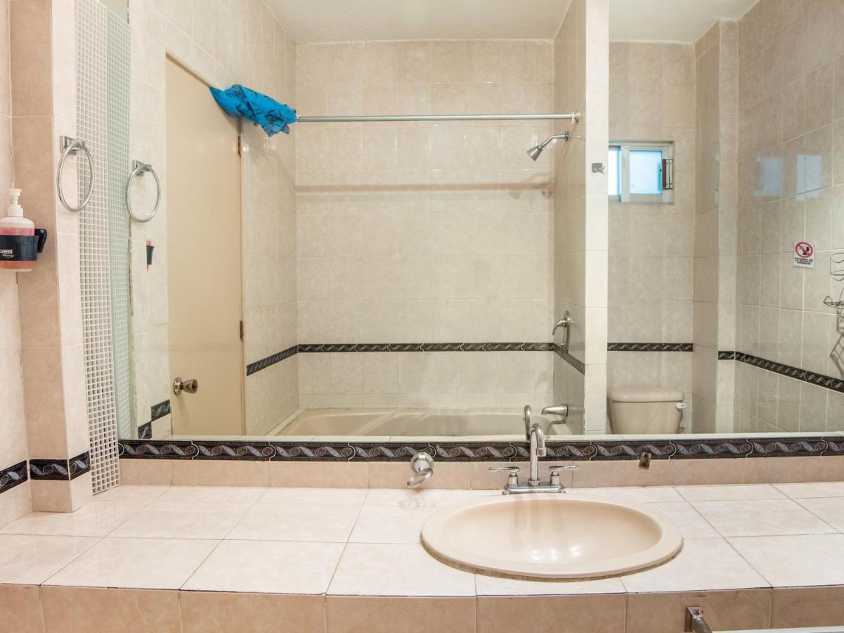 بويبلا Capital O Hotel Villa Monini المظهر الخارجي الصورة