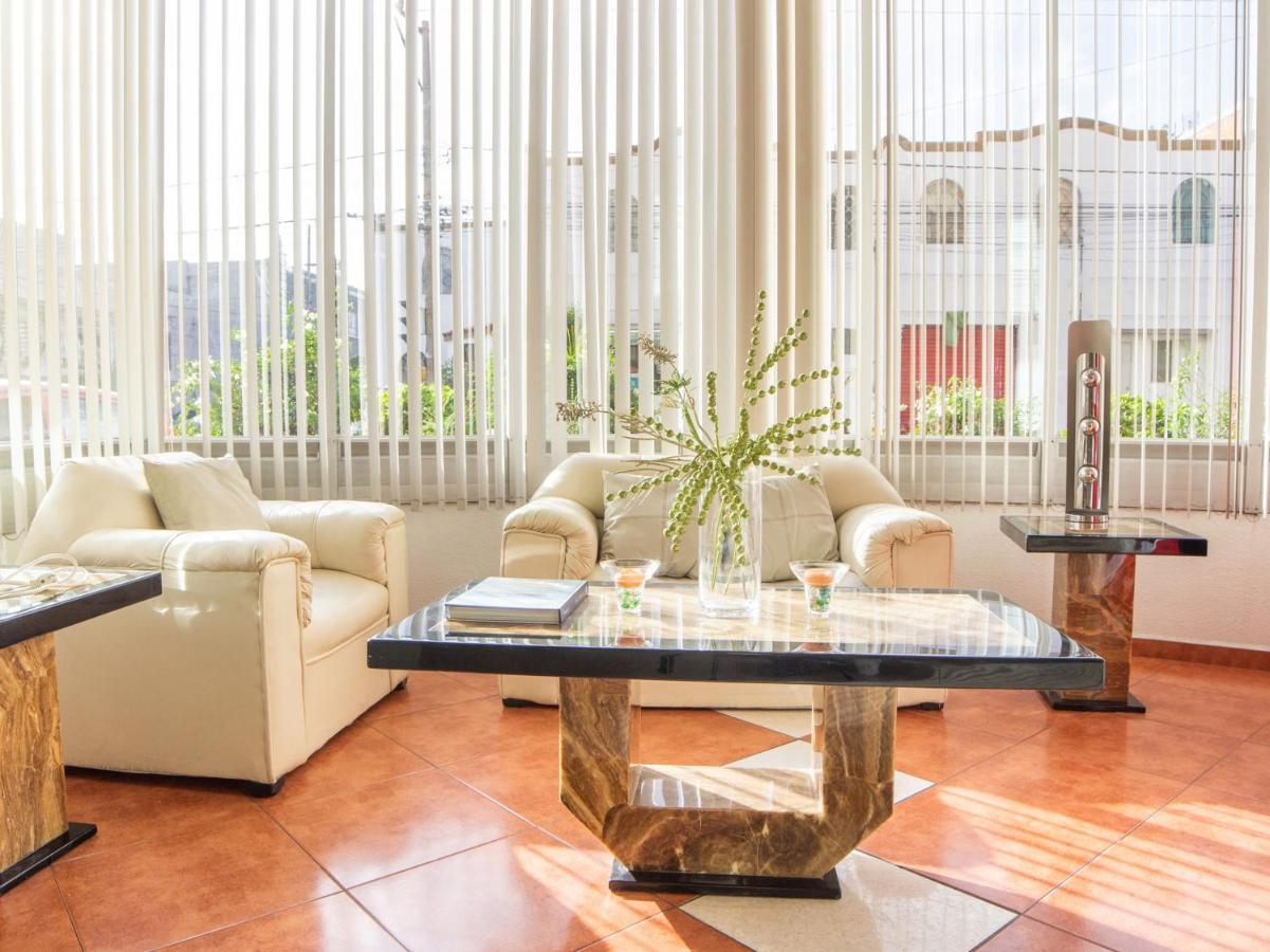 بويبلا Capital O Hotel Villa Monini المظهر الخارجي الصورة