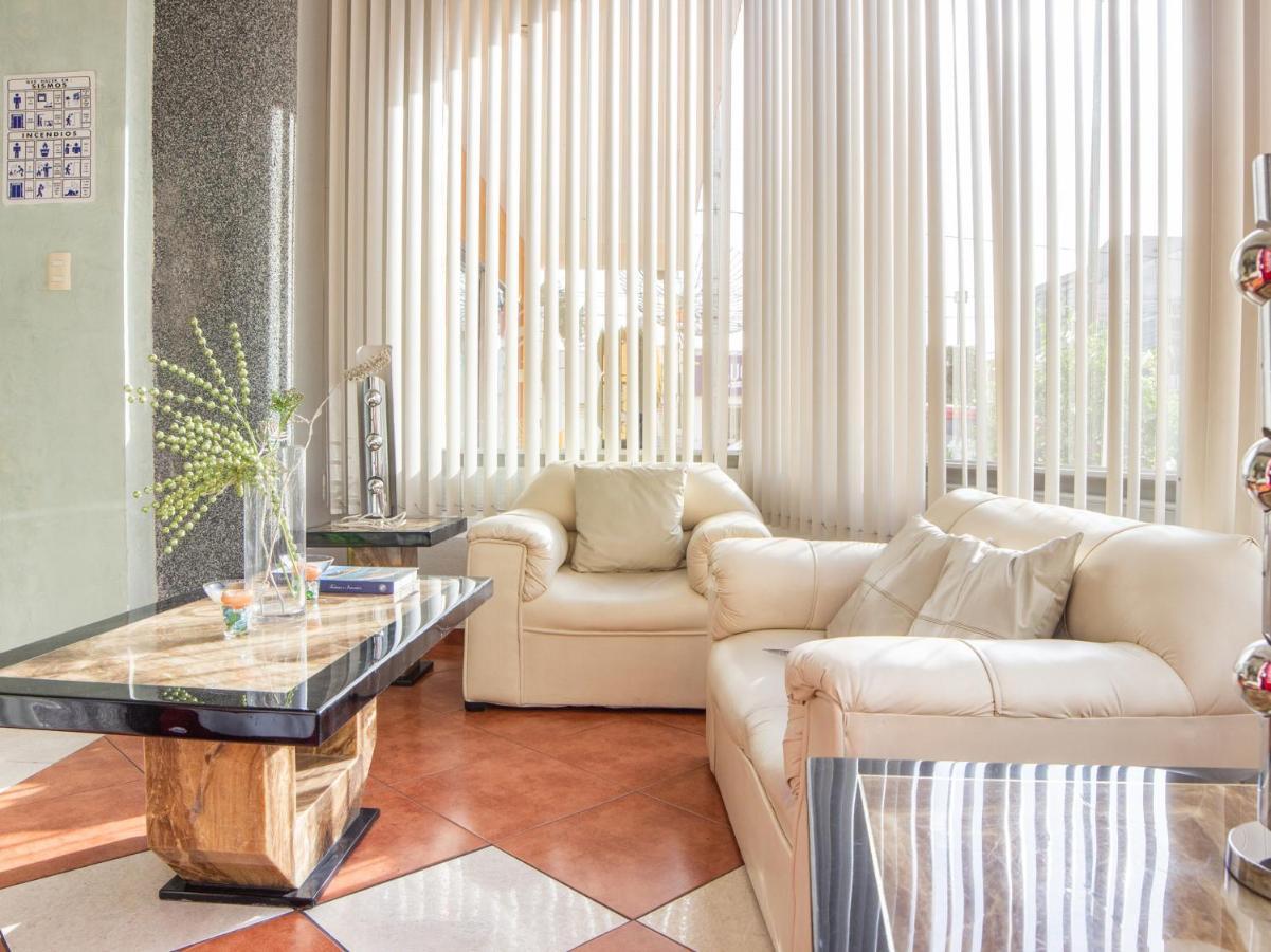 بويبلا Capital O Hotel Villa Monini المظهر الخارجي الصورة