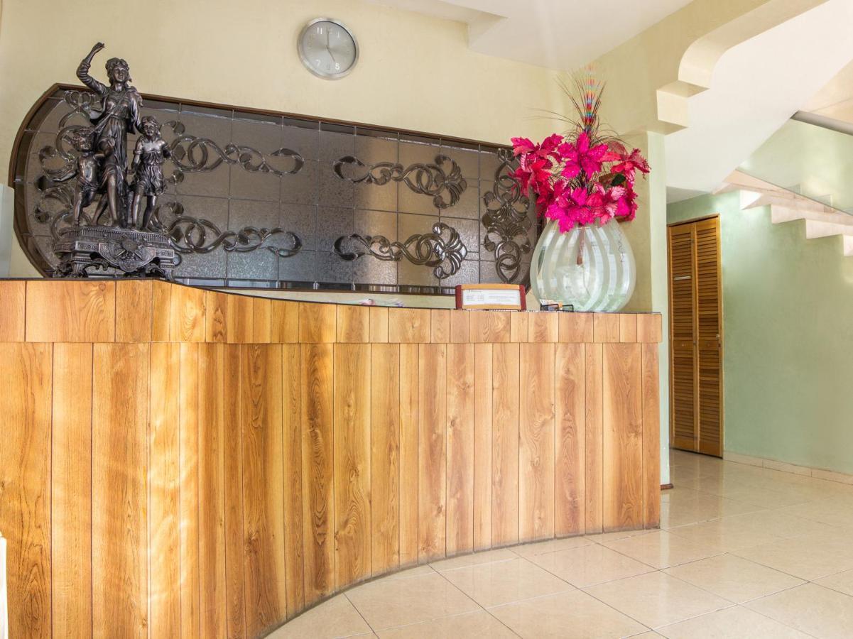 بويبلا Capital O Hotel Villa Monini المظهر الخارجي الصورة